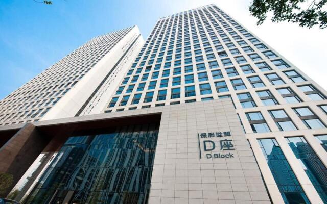 Отель Yishang Baoli Shimao International Apartment Китай, Гуанчжоу - отзывы, цены и фото номеров - забронировать отель Yishang Baoli Shimao International Apartment онлайн вид на фасад