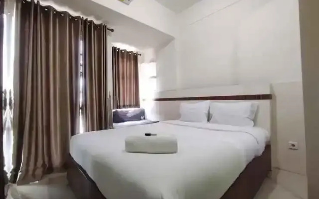 Convenient and Cozy Studio at Vida View Makassar By Travelio