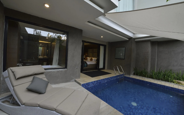 Отель Amaroossa Suite Bali