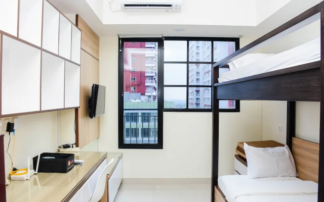 Cozy Studio At Evenciio Margonda Apartment
