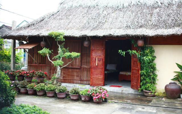 Гостевой Дом Petunia Garden Homestay вид на фасад