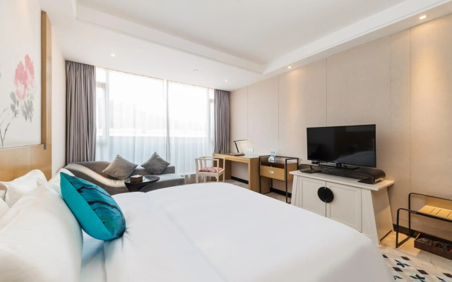 Paco Business Hotel Luo Gang Wan Da Branch
