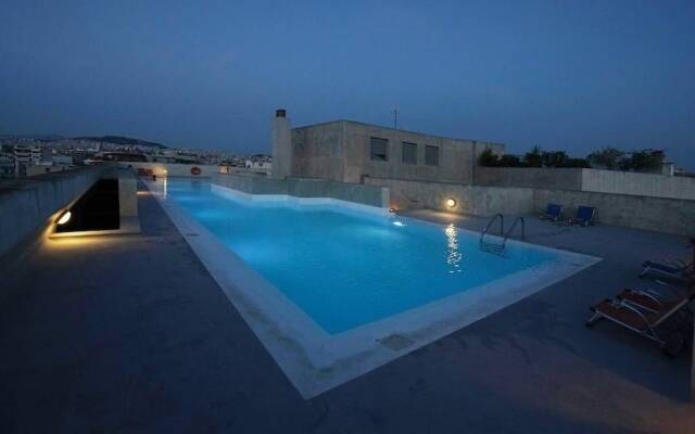 Relaxing By The Pool Gazing Acropolis 2