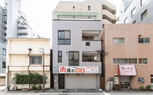Отель Condominium Tsudoi Fukuoka Хаката вид на фасад