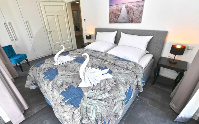 Villa "Levante" F659 Penthouse mit Kamin, Sauna, Seeblick