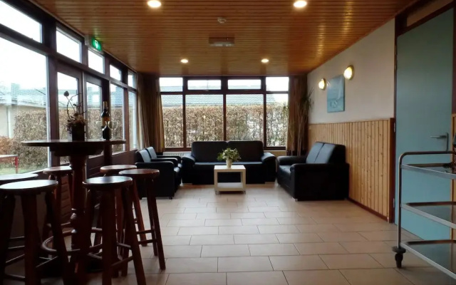 Tidy House with Fireplace near North Sea Beach