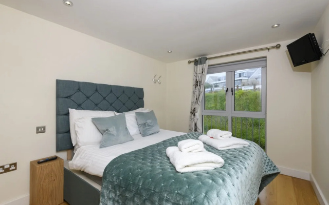 The Beach House & Porth Sands Apartments