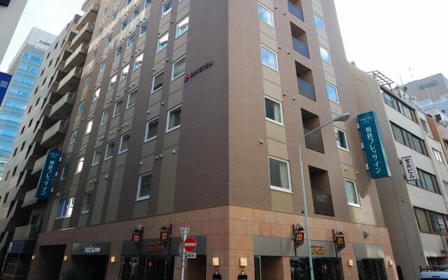 Отель Sotetsu Fresa Inn Tokyo-Kyobashi вид на фасад
