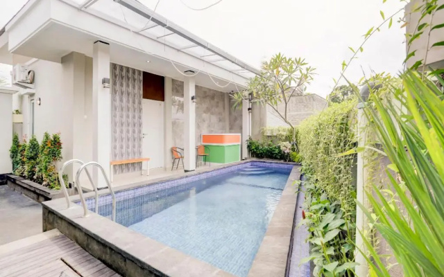Oyo 90057 Riverside Bali Villas
