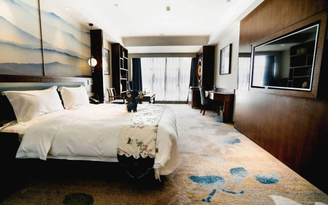 Tang Xiao-Zhu · Tangshan Feast Cultural and Tourism Hotel
