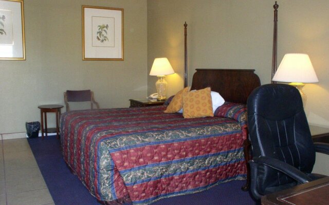 Отель American Executive Inn комната для гостей