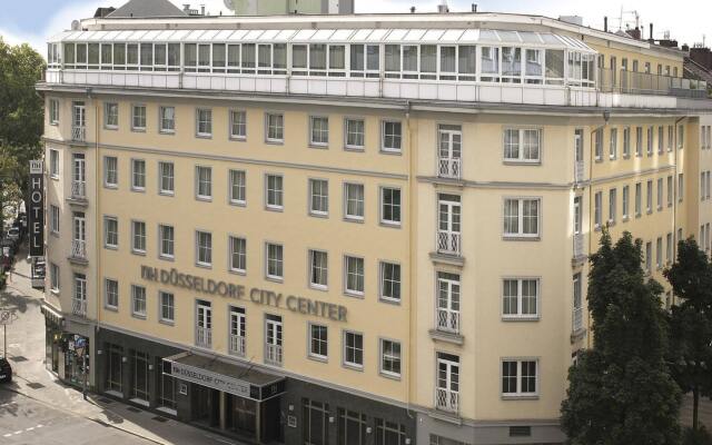 Отель Nh Konigsallee Дюссельдорф вид на фасад