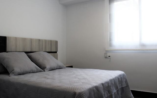 Отель Apartamento en el Parque Central. Estación del Ave комната для гостей