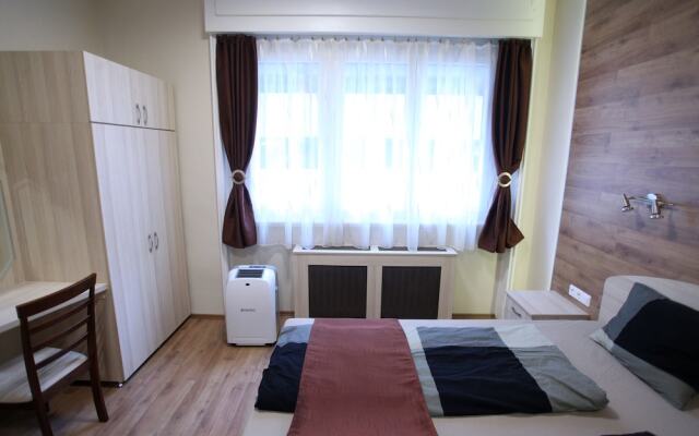 Апартаменты Dfive Apartments - Premium Studio комната для гостей
