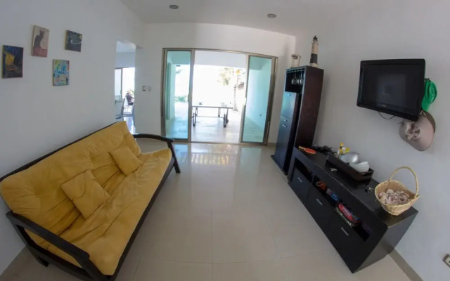 Piña Beach House in San Benito Beach