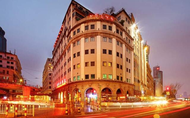 Отель Xin Hua Hotel Guangzhou Китай, Гуанчжоу - отзывы, цены и фото номеров - забронировать отель Xin Hua Hotel Guangzhou онлайн вид на фасад