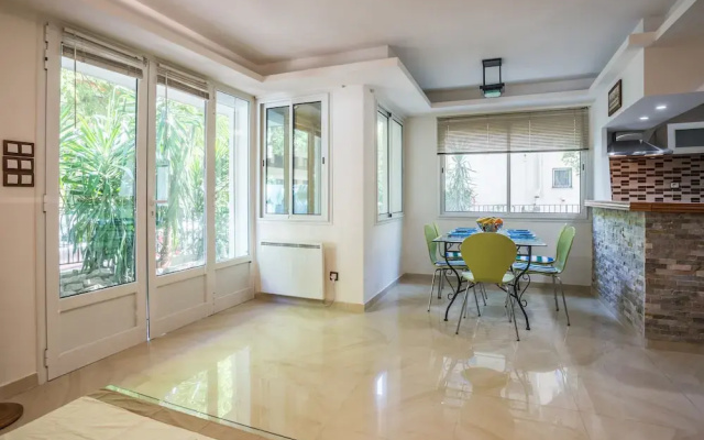 2 BDRM flat with 260m2 garden-Congress/Beaches by Weekome