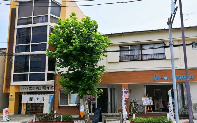 Отель Japanese Condominium UNO Ито вид на фасад