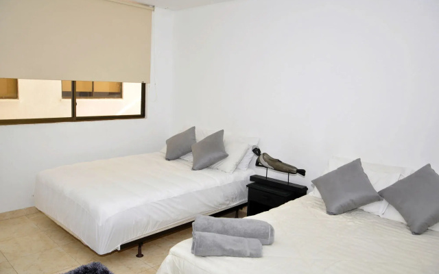 Отель Axis Inn by GEH Suites