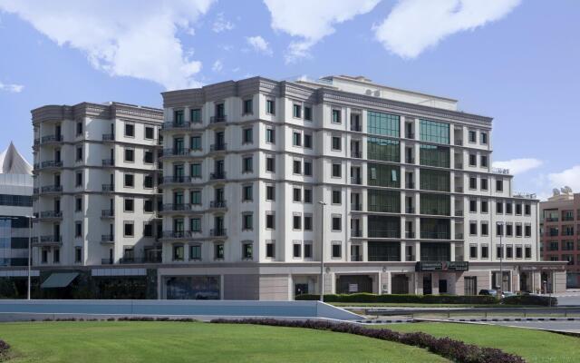 Al Waleed Palace Hotel Apartments Oud Metha вид на фасад