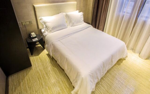Апартаменты Fu Qian Ming Tai Service Apartment комната для гостей