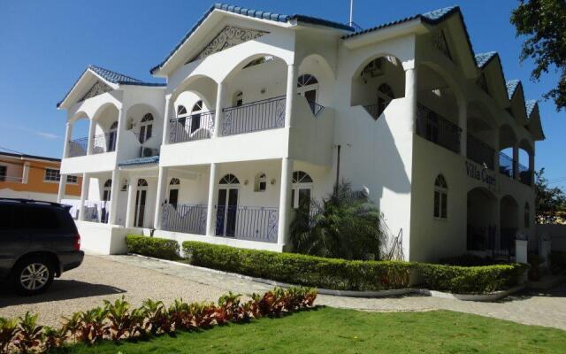 Отель Villa Capri Salon & SPA Доминикана, Бока Чика - отзывы, цены и фото номеров - забронировать отель Villa Capri Salon & SPA онлайн вид на фасад