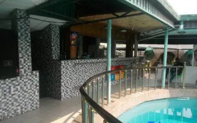 Cynergy Suites Festac Town - Guest Room