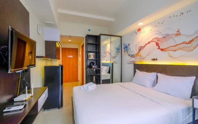 Cozy Stay and Tidy Studio at Evenciio Margonda Apartment