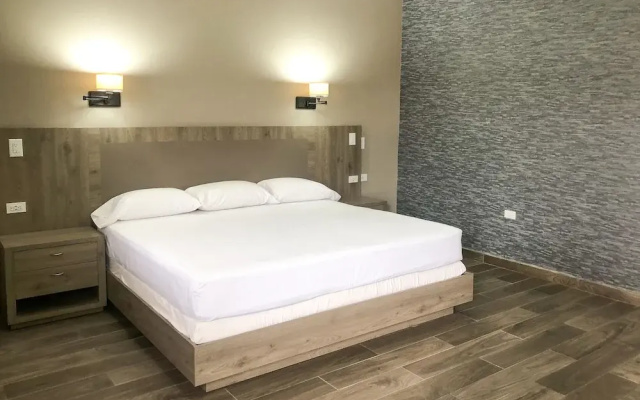 Capital O Palms Hotel