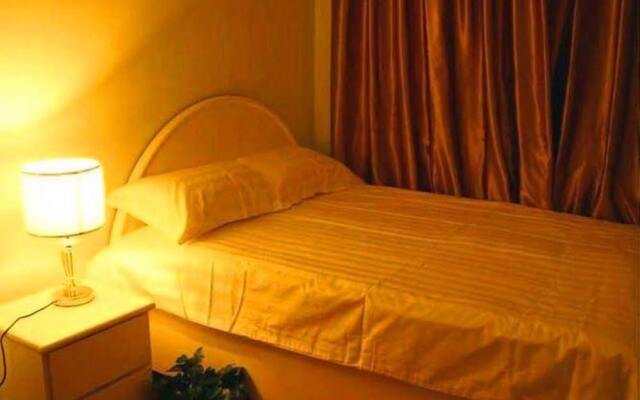 Отель Gulangyu Lianhe Apartment Hotel - Xiamen Китай, Сямынь - отзывы, цены и фото номеров - забронировать отель Gulangyu Lianhe Apartment Hotel - Xiamen онлайн комната для гостей