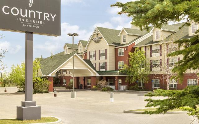 Отель Country Inn & Suites by Radisson, Calgary-Airport, AB Канада, Калгари - отзывы, цены и фото номеров - забронировать отель Country Inn & Suites by Radisson, Calgary-Airport, AB онлайн вид на фасад