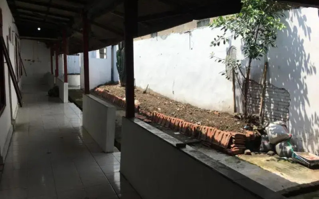 Tambak Bayan Guesthouse by ZUZU