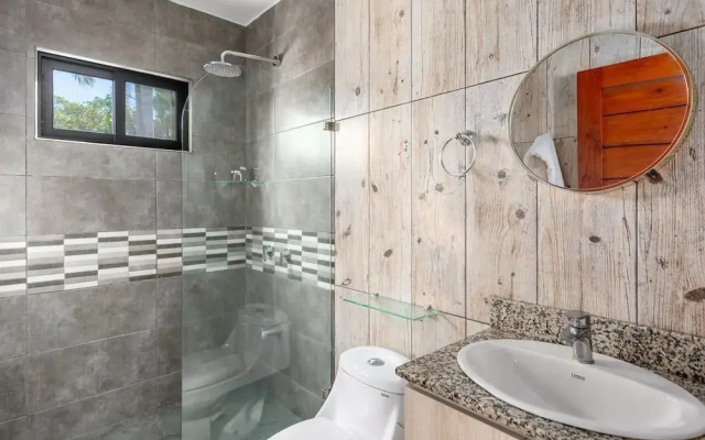 Ultramodern Townhome with an Inviting Coastal Design and Lush Outdoor Oasis with a Private Pool