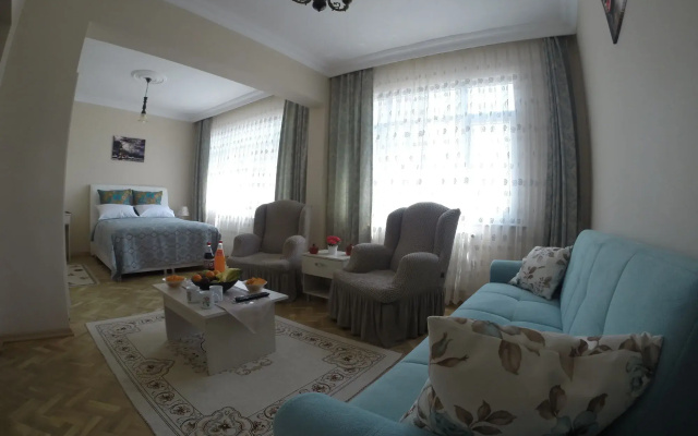 Atam Hotel & Suites