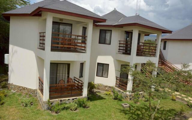 Отель Sentrim Elementaita Lodge Кения, Накуру - отзывы, цены и фото номеров - забронировать отель Sentrim Elementaita Lodge онлайн вид на фасад