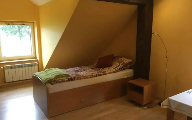 Apartament Pod Garbem