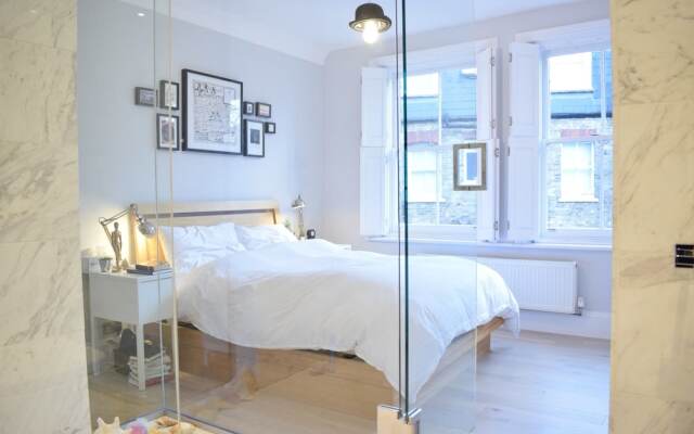 Отель Modern and Spacious Belsize Park Apartment Великобритания, Лондон - отзывы, цены и фото номеров - забронировать отель Modern and Spacious Belsize Park Apartment онлайн комната для гостей