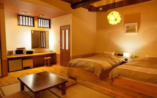 Отель Ryokan Iroha Япония, Беппу - отзывы, цены и фото номеров - забронировать отель Ryokan Iroha онлайн комната для гостей
