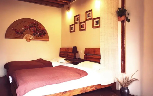 Shaxi Miss May Hotel