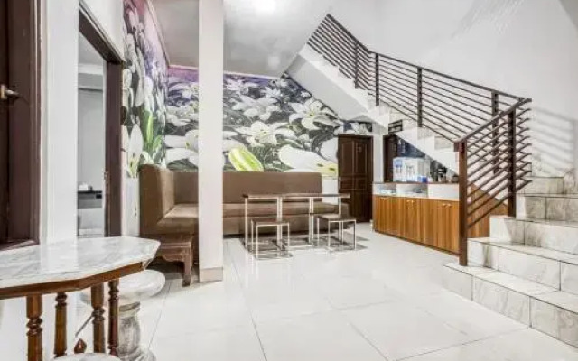 OYO 188 Wisma Nely Murni Guesthouse