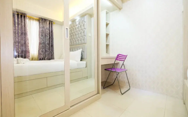 Pool View 2BR Bassura City Apartment By Travelio