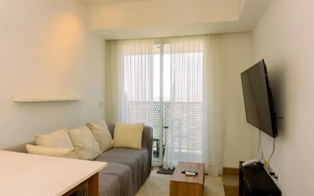 Spacious 1BR with Japandi Design at West Vista Apartment By Travelio