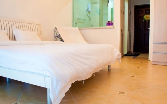 Апартаменты Lezai Lvtu Seaview Holiday Apartment комната для гостей