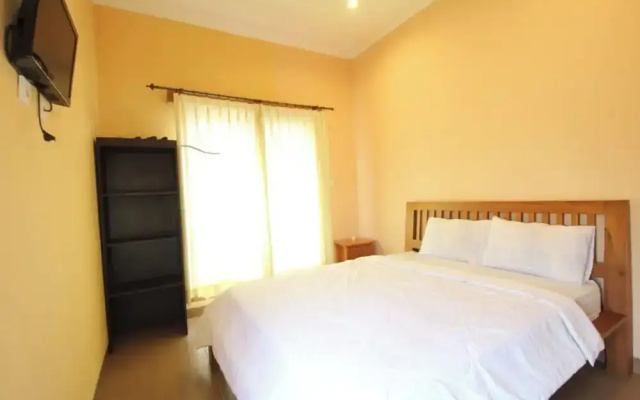 Capital O 94011 Binhari Guest House