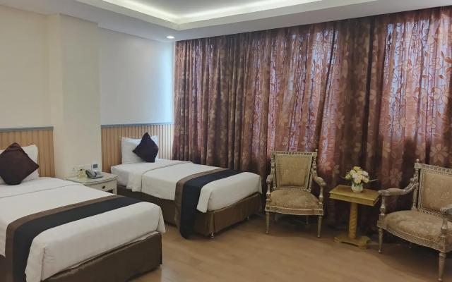 Amos Cozy Hotel & Convention Hall