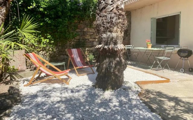 Gîte Le Palmier - Perfectly located cosy studio with private garden