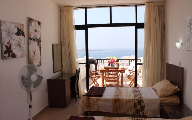 Отель Seashells Penthouse Bugibba Буджибба комната для гостей
