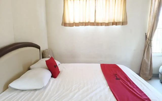 RedDoorz Syariah Near Rumah Sakit Umum Wisata Uit(RedDoorz Syariah near Rumah Sakit Umum Wisata UIT)