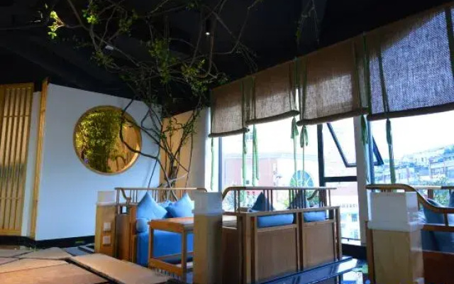 Youjia Traders Hotel (Pengzhou Longxing Temple)