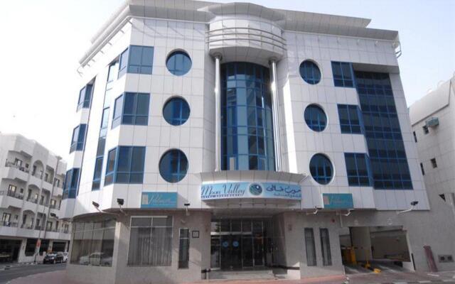 Отель Moon Valley Hotel Apartment ОАЭ, Дубай - отзывы, цены и фото номеров - забронировать отель Moon Valley Hotel Apartment онлайн вид на фасад